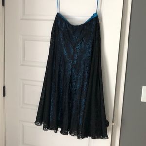 Black lace and blue satin skirt